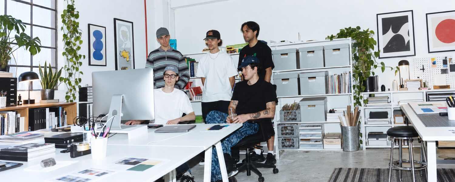 A creative team reviewing their work together