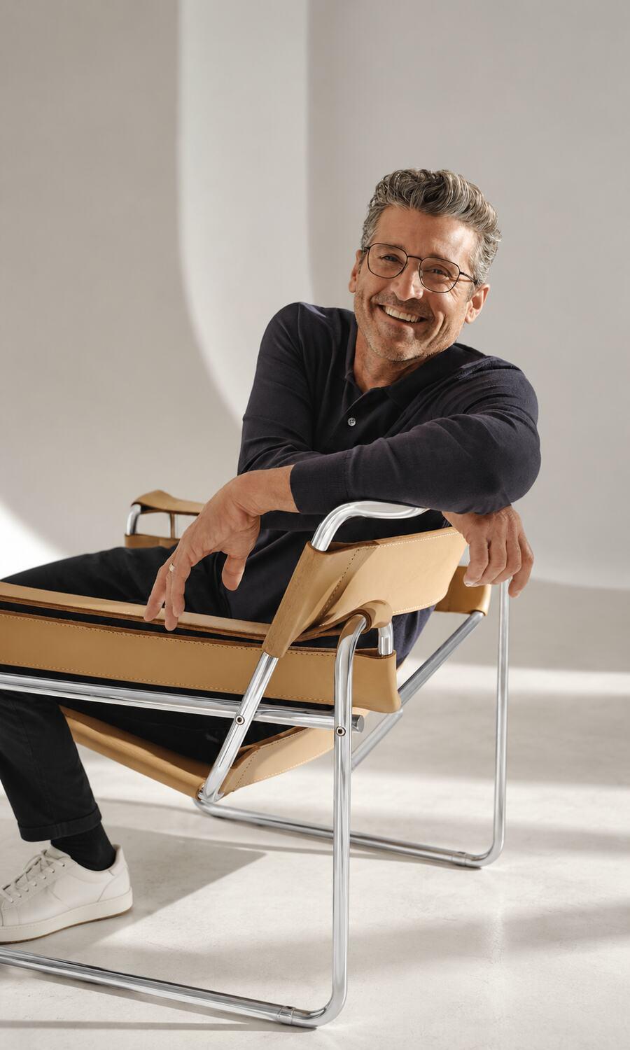 Company owner seated in a creative office