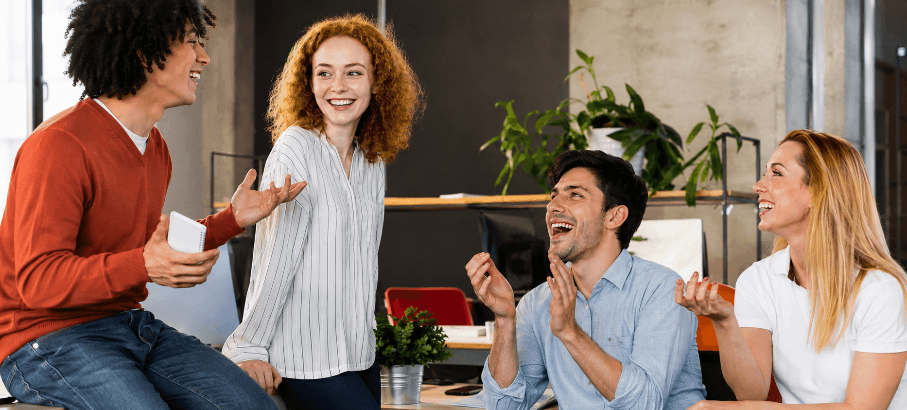 Team laughing together in the office