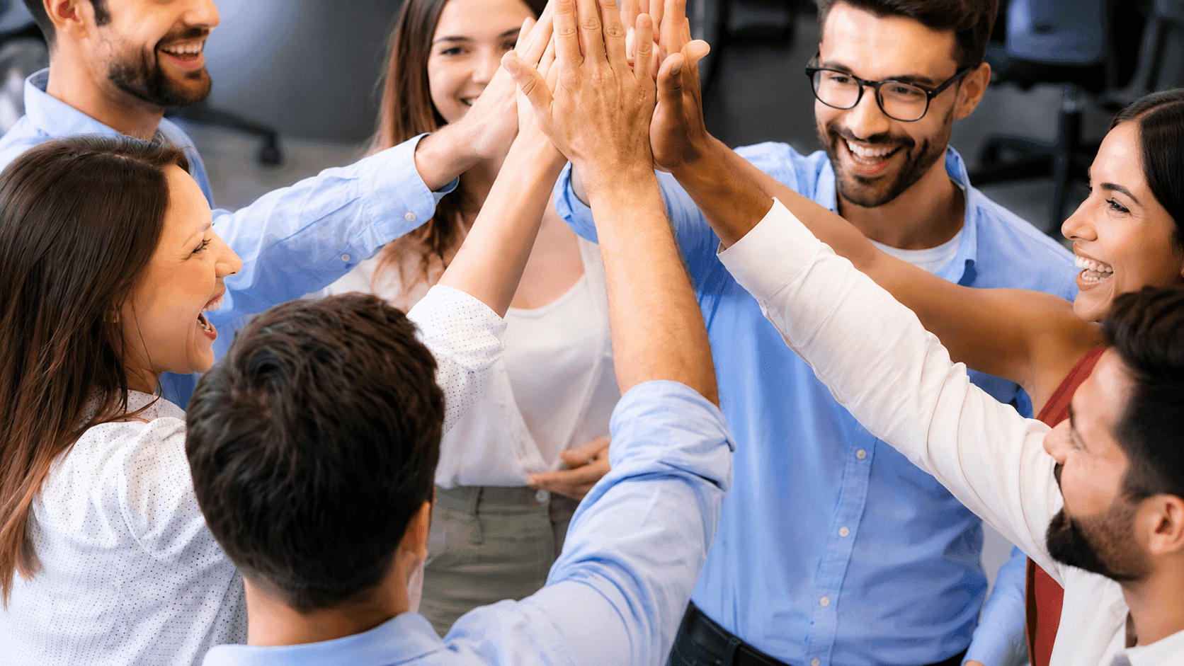 Team celebrating with a high five